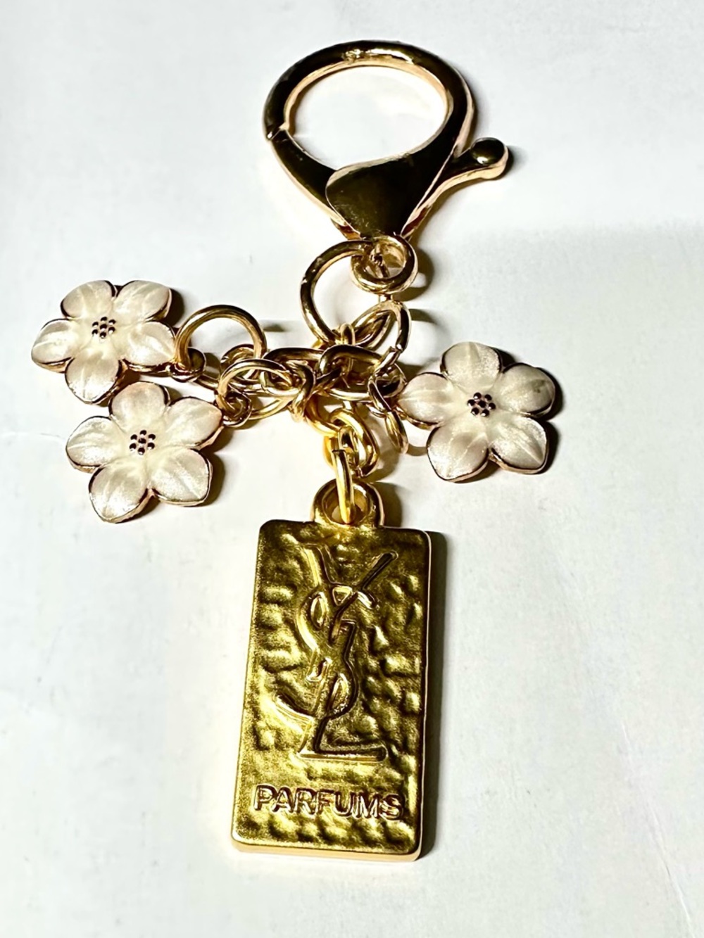 Yves Saint Laurent  (YSL) Gold Tone Keychain GWP w/3 Add on white flower charms